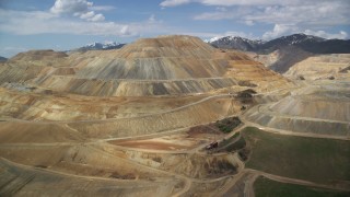 AX130_033 - 5.5K aerial stock footage of flying by Bingham Canyon Mine (Kennecott Copper Mine), Utah