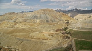 AX130_033E - 5.5K aerial stock footage of passing by Bingham Canyon Mine (Kennecott Copper Mine), Utah