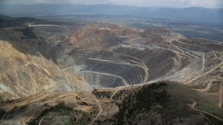 AX130_047 - 5.5K aerial stock footage of flying around the Bingham Canyon Mine (Kennecott Copper Mine), Utah