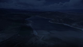 AX130_152_DFN - Aerial stock footage of 4K day for night color corrected aerial footage of flying over Gunnison Reservoir, low water, Sanpete County, Utah