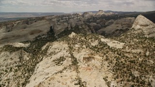 AX130_317 - 5.5K aerial stock footage approach the Waterpocket Fold rock formations, Capitol Reef National Park, Utah