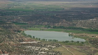 AX130_399E - 5.5K aerial stock footage of Wide Hollow Reservoir, Grand Staircase-Escalante National Monument, Utah
