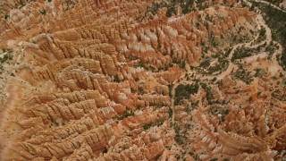 AX130_437 - 5.5K stock footage aerial video of bird's eye orbit of large group of hoodoos, Bryce Canyon National Park, Utah