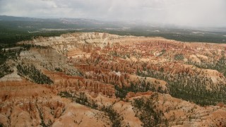 AX130_476E - 5.5K aerial stock footage of hoodoos and buttes at Bryce Canyon National Park, Utah