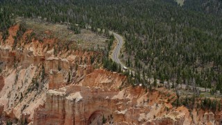 AX131_027 - 5.5K aerial stock footage of Highway 63 and Pink Cliffs, Bryce Canyon National Park, Utah