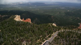 AX131_032 - 5.5K aerial stock footage approach hills, rock formations, Pink Cliffs, Bryce Canyon National Park, Utah