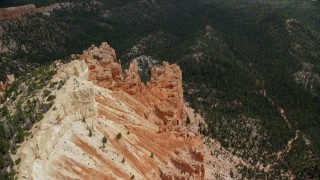 AX131_033 - 5.5K aerial stock footage tilt to bird's eye view of rock formations, Pink Cliffs, Bryce Canyon National Park, Utah