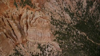 AX131_034 - 5.5K aerial stock footage of orbiting and flying away from Pink Cliffs, Bryce Canyon National Park, Utah