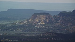 AX131_038 - 5.5K aerial stock footage of flying by large butte, Grand Staircase-Escalante National Monument, Utah
