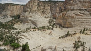 AX131_052 - 5.5K aerial stock footage of approaching a rock formation, Grand Staircase-Escalante National Monument, Utah