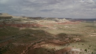 AX131_093E - 5.5K aerial stock footage descend and approach Highway 89, Glen Canyon National Recreation Area, Utah, Arizona