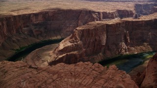 AX131_218 - 5.5K aerial stock footage of Horseshoe Bend, and Colorado River in the deep Glen Canyon, Arizona