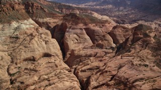 AX132_061E - 5.5K aerial stock footage of an approach to rock formations at Navajo Mountain, Utah