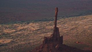AX133_045 - 5.5K stock footage aerial video of Totem Pole Butte in Monument Valley, Utah, Arizona, twilight