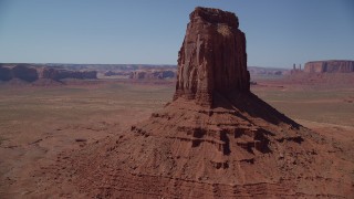 AX135_116 - 5.5K stock footage aerial video approach and flyby East Mitten Butte, reveal Elephant Butte, Monument Valley, Utah, Arizona