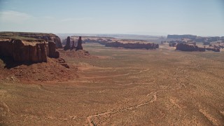 AX136_014E - 5.5K aerial stock footage flyby buttes and mesas, revealing Elephant Butte in Monument Valley, Utah, Arizona