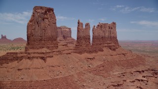 AX136_037 - 5.5K stock footage aerial video of approaching towering desert buttes in Monument Valley, Utah, Arizona