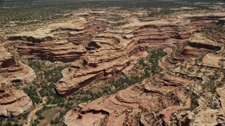 AX136_066E - 5.5K aerial stock footage of a view of desert mesas and canyons, Cedar Mesa, Utah