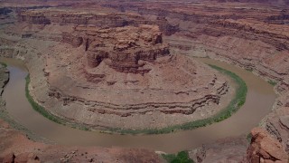 AX136_234 - 5.5K aerial stock footage of orbiting Colorado River through Meander Canyon, Canyonlands National Park, Utah