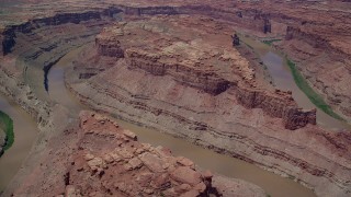 AX136_240 - 5.5K aerial stock footage fly over Colorado River and buttes in Meander Canyon, Canyonlands National Park, Utah