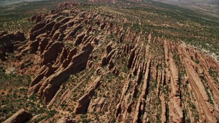AX137_015E - 5.5K aerial stock footage of flying over rock fins in Devil's Garden, Arches National Park, Utah