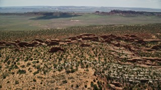 AX137_017 - 5.5K aerial stock footage of a view of rock fins in Devil's Garden, Arches National Park, Utah