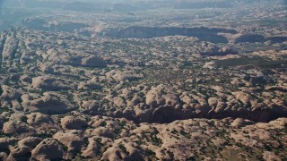 AX138_038E - 5.5K aerial stock footage of a view of petrified sand dune rock formations at Sand Flats Recreation Area, Utah