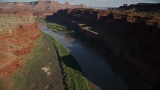 AX138_085E - 5.5K aerial stock footage flight over Colorado River River in Goose Neck area of Meander Canyon, Canyonlands National Park, Utah