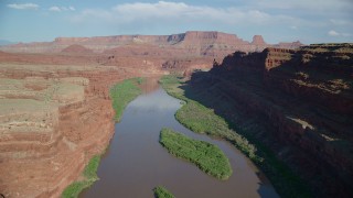 AX138_086 - 5.5K aerial stock footage of a flight though Goose Neck area, Meander Canyon, following the river, Canyonlands National Park, Utah