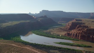 AX138_109 - 5.5K aerial stock footage of the Colorado River in Meander Canyon, Canyonlands National Park, Utah