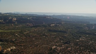 AX138_125 - 5.5K aerial stock footage of part of Taylor Canyon in Canyonlands National Park, Utah