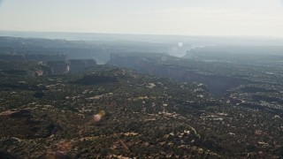 AX138_126E - 5.5K aerial stock footage of an arm of Taylor Canyon, Canyonlands National Park, Utah