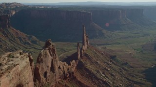 AX138_136 - 5.5K aerial stock footage approach the Zeus and Moses Butte in Canyonlands National Park, Utah