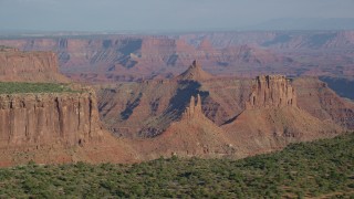 AX138_148 - 5.5K aerial stock footage of buttes in Shafer Canyon in Canyonlands National Park, Utah