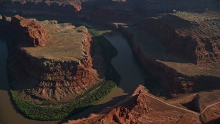 AX138_159 - 5.5K aerial stock footage fly over Meander Canyon's Goose Neck in Canyonlands National Park, Utah