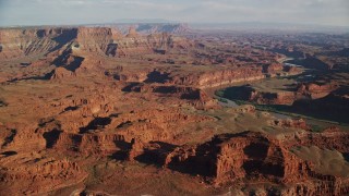 AX138_167 - 5.5K aerial stock footage approach mesas beside the Colorado River in Moab, Utah
