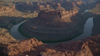 AX138_294 - 5.5K aerial stock footage circle The Loop East part of Meander Canyon and Colorado River, Canyonlands National Park, Utah, sunset