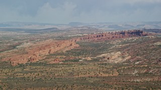 AX139_008E - 5.5K aerial stock footage of a view of Devil's Garden rock formations, Arches National Park, Utah