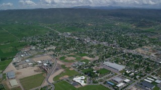 AX140_177 - 5.5K aerial stock footage of small town neighborhoods with baseball fields, Heber City, Utah