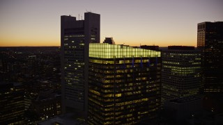 AX141_035 - 5.5K aerial stock footage of Russia Wharf, Federal Reserve Bank, Downtown Boston, Massachusetts, twilight