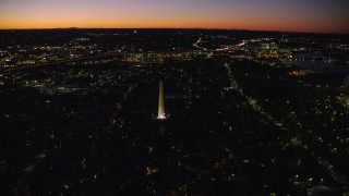AX141_068E - 5.5K aerial stock footage orbiting the Bunker Hill Monument, Charlestown, Massachusetts, twilight