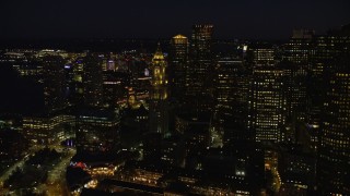 AX141_075E - 5.5K aerial stock footage approaching Custom House Tower, Downtown Boston, Massachusetts, night