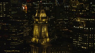 AX141_078 - 5.5K aerial stock footage orbiting top of Custom House Tower, Downtown Boston, Massachusetts, night 
