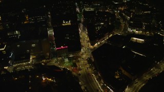 AX141_104 - 5.5K aerial stock footage of a bird's eye view over Harvard Square, Massachusetts Avenue, Harvard University, Massachusetts, night