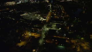 AX141_108 - 5.5K aerial stock footage approaching Western Avenue, Allston, Massachusetts, night