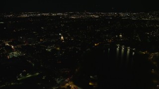 AX141_113 - 5.5K stock footage aerial video flying by the Lowell House, Harvard University, Massachusetts, night