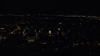 AX141_120 - 5.5K stock footage aerial video orbiting Lowell House on campus, Harvard University, Massachusetts, night