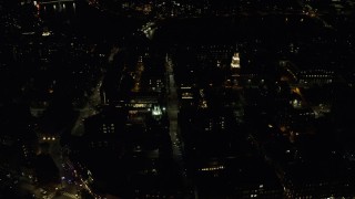 AX141_124 - 5.5K stock footage aerial video orbiting Adams House and Lowell House, Harvard University, Massachusetts, night