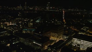 AX141_151E - 5.5K aerial stock footage flying by office buildings and the Massachusetts Institute of Technology, Cambridge, Massachusetts, night