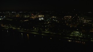 AX141_156E - 5.5K aerial stock footage flying by MIT campus, Massachusetts Institute of Technology, Cambridge, Massachusetts, night